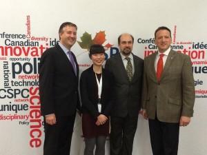 The NDP's Kennedy Stewart and Laurin Liu pose with Canadian Science Policy Centre president Mehrdad Hariri and science minister Greg Rickford at CSPC 2013.